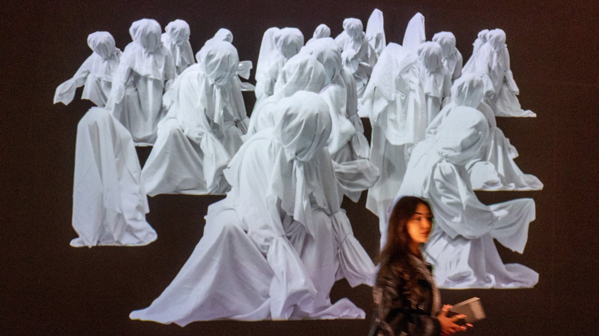 A patient, who is a part of a project in which doctors prescribe museum visits, walks past an artwork in the Art and History Museum, Neuchatel, Switzerland, March 11, 2025. (Reuters Photo)