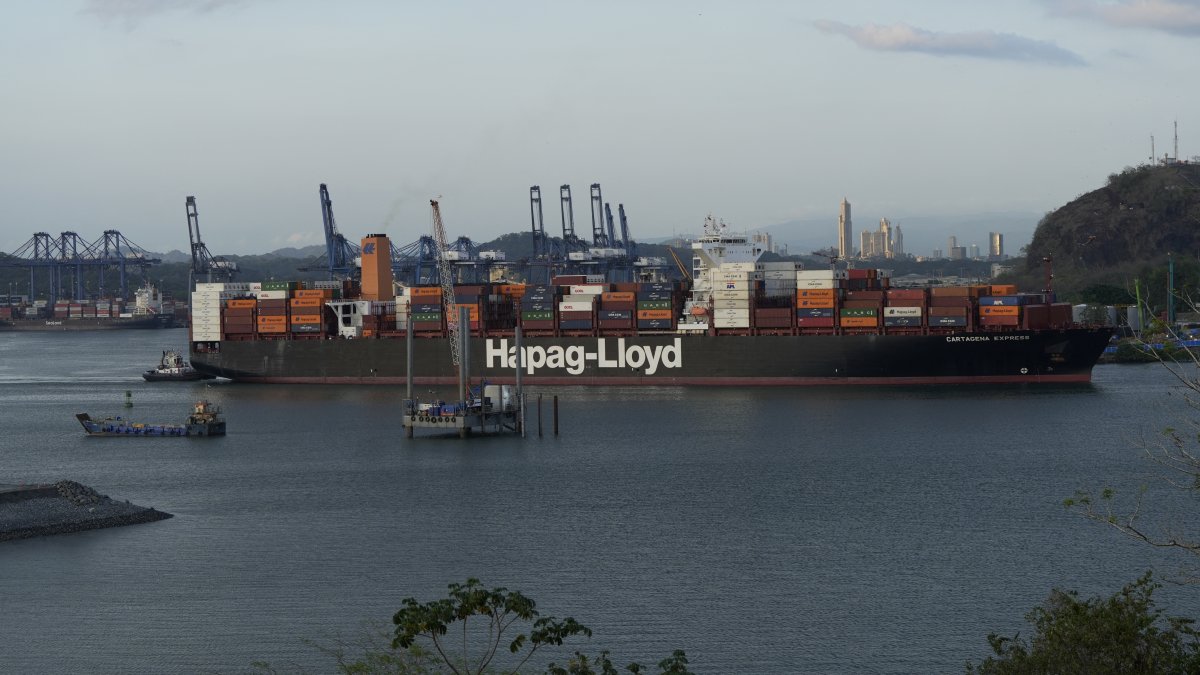 A cargo ship sails through the Panama Canal next to the entrance of the Balboa Port, Panama City, Panama, March 13, 2025. (Reuters Photo)