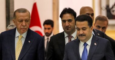 Iraqi Prime Minister Mohammed Shia Al Sudani (R) and President Recep Tayyip Erdoğan arrive for the signing of the "Development Road" framework agreement on security, economy and development, Baghdad, Iraq, April 22, 2024. (Reuters Photo)