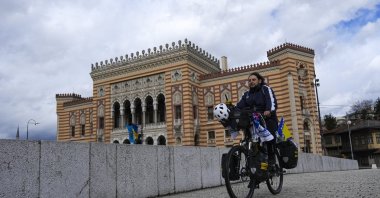 Turkish cyclist explores historic streets while passing through on his Hajj journey, Sarajevo, Bosnia-Herzegovina., March 13. 2025. (AA Photo)