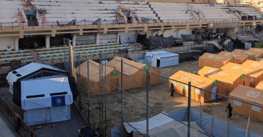 Displaced Palestinians take shelter in a tent camp set up at Palestine Stadium, which was damaged during the Israeli offensive, Gaza City, Palestine, March 11, 2025. (Reuters Photo)
