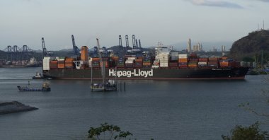 A cargo ship sails through the Panama Canal next to the entrance of the Balboa Port, Panama City, Panama, March 13, 2025. (Reuters Photo)