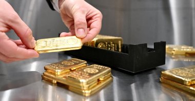 Gold bars are stacked in the safe deposit boxes room of a gold house in Munich, Germany, Jan. 10, 2025. (Reuters Photo)