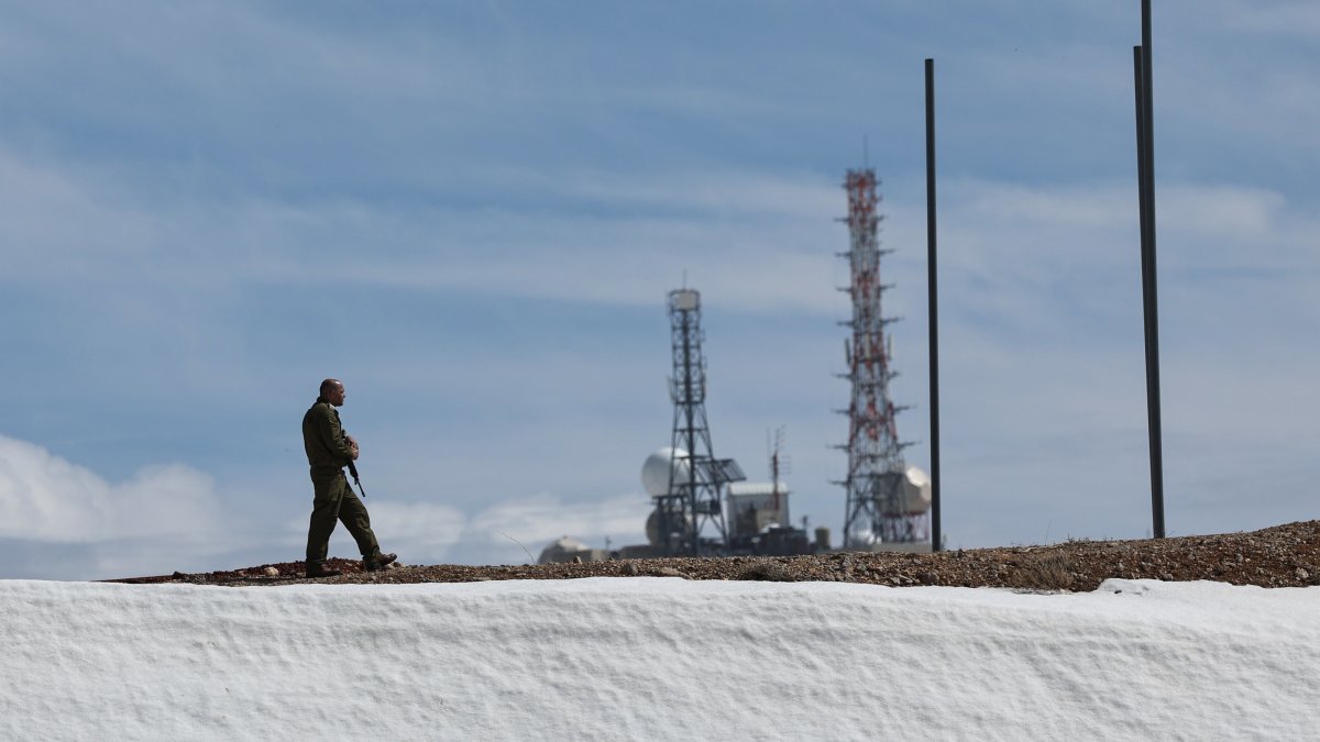 An Israeli soldier stands guard near an army base on Mount Hermon, the Israeli-annexed Golan Heights, Syria, March 4, 2025. (EPA Photo)