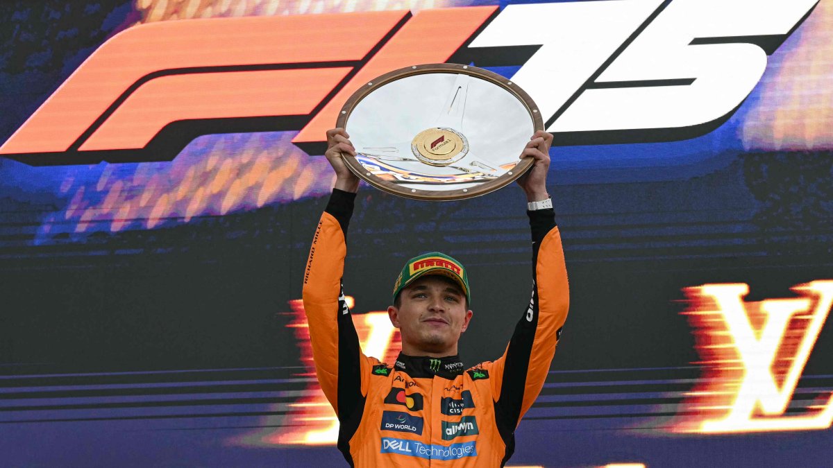 McLaren&#039;s British driver, Lando Norris, celebrates winning the Australian F1 GP in Melbourne, Australia, March 16, 2025. (AFP Photo)