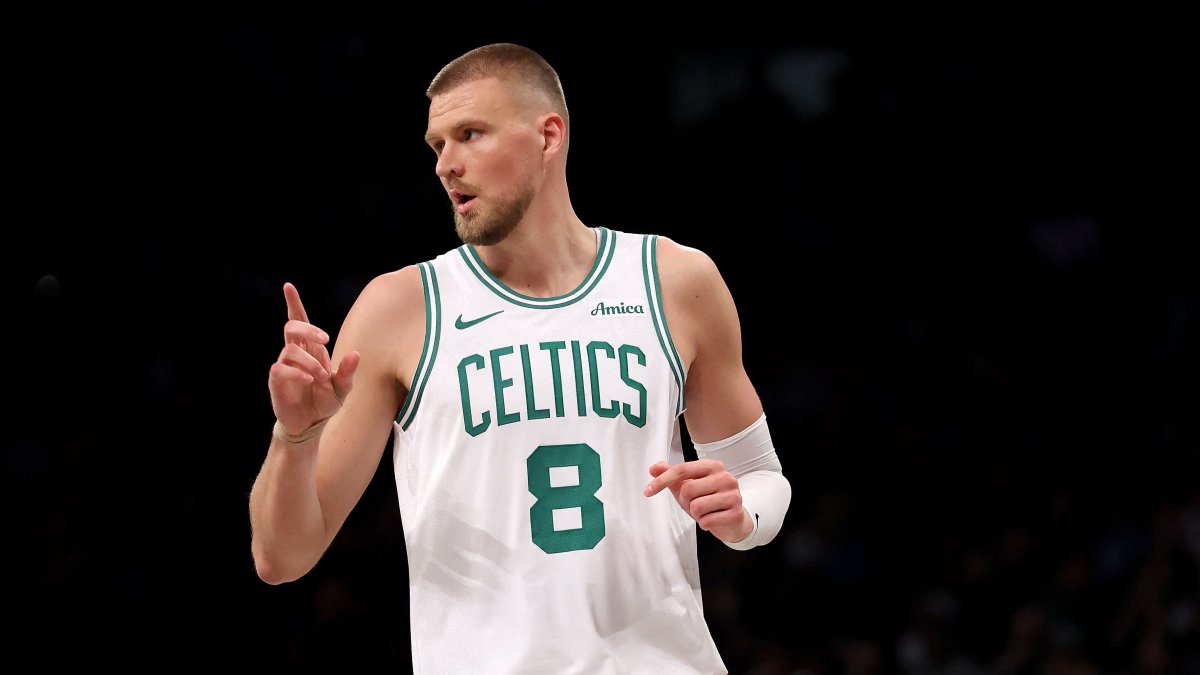 Celtics&#039; Kristaps Porzingis celebrates a 3-point shot during an NBA game against the Brooklyn Nets, New York City, U.S., March 15, 2025. (AFP Photo)
