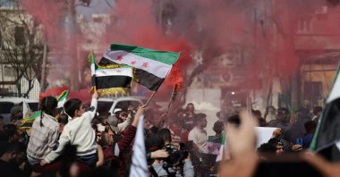 People gather during a demonstration marking the 14th anniversary of the start of the Syrian conflict, Idlib, Syria, March 15, 2025. (Reuters Photo)