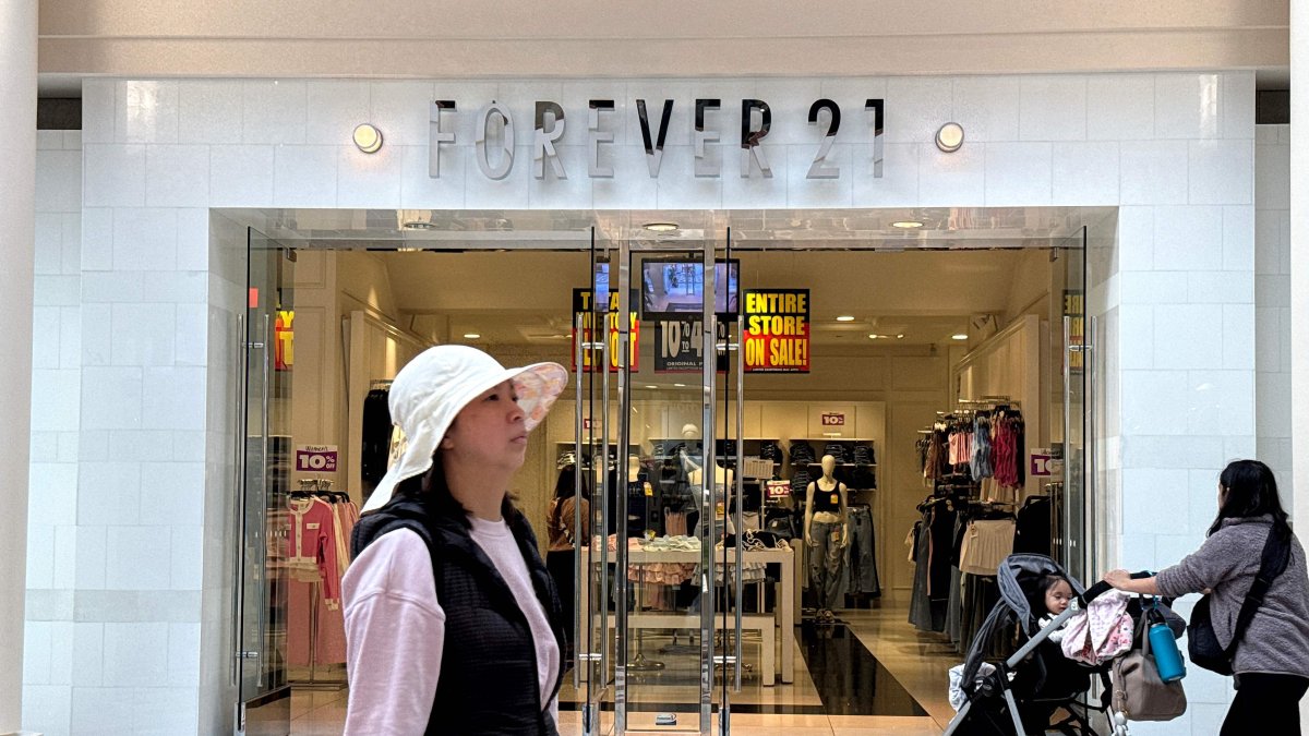 A pedestrian walks by a Forever 21 store in San Francisco, California, U.S., Feb. 20, 2025. (AFP Photo)