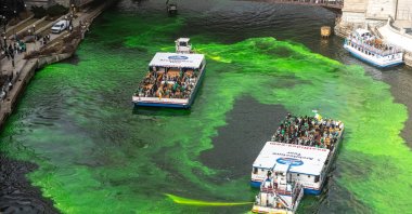 An aerial view of the Chicago River being dyed green, Chicago, U.S., March 15, 2025. (AA Photo)