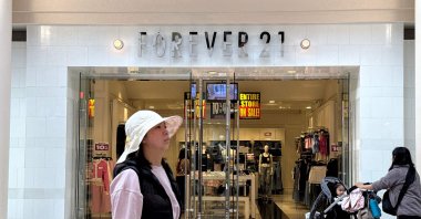 A pedestrian walks by a Forever 21 store in San Francisco, California, U.S., Feb. 20, 2025. (AFP Photo)