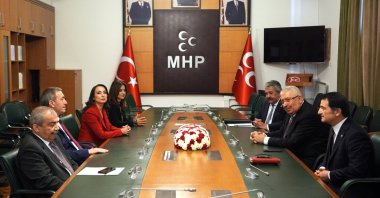 The Peoples’ Equality and Democracy Party (DEM Party) delegation (L) meets Nationalist Movement Party (MHP) deputy chairs at the MHP&#039;s offices at Parliament, Ankara, Türkiye, March 17, 2025. (AA Photo)