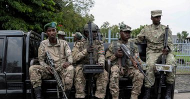 M23 rebels sit on a truck during the escort of captured FDLR members to Rwanda for repatriation, at the Goma-Gisenyi Grande Barrier border crossing, March 1, 2025. (Reuters Photo)