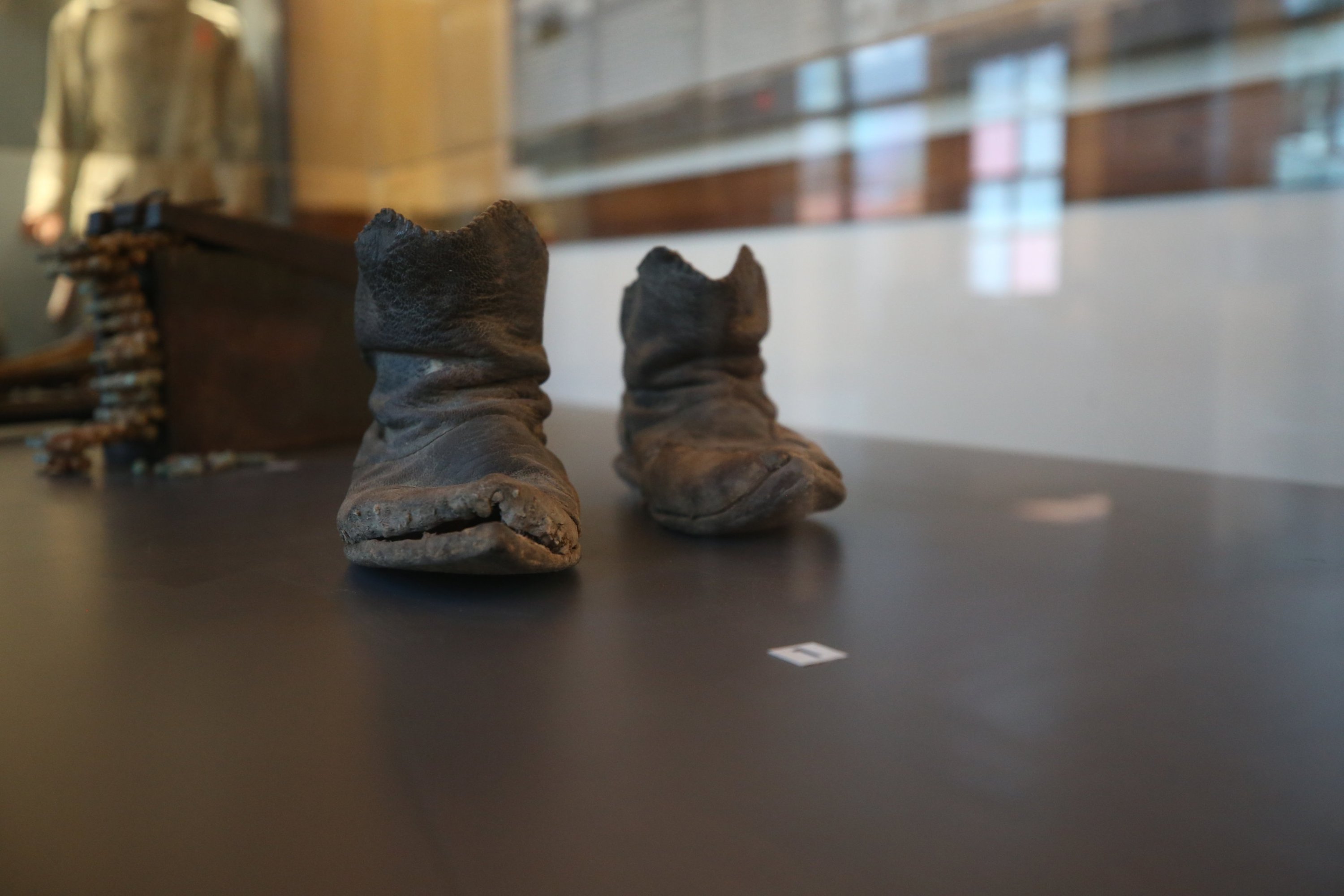 The worn shoes of 94 scouts and students are displayed at the Balıkesir Liseli Keşşaflar Museum, Balıkesir, Türkiye, March 10, 2025. (AA Photo)