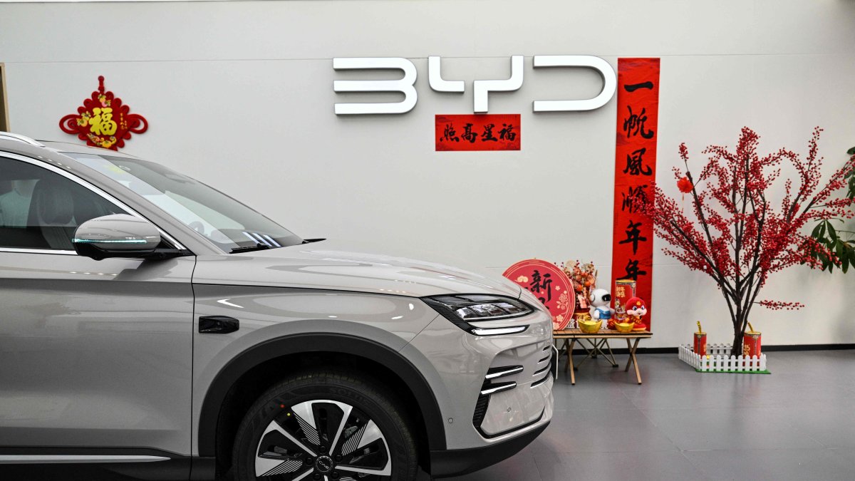 A BYD Plus DM-i electric vehicle is seen on display at a showroom in the Jing&#039;an district of Shanghai, China, March 11, 2025. (AFP Photo)