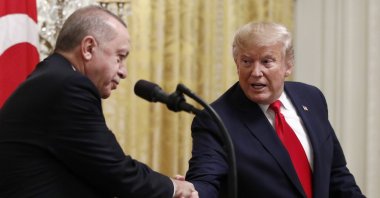 U.S. President Donald Trump (R) shakes hands with President Recep Tayyip Erdoğan during a news conference at the White House, Washington, U.S., Nov. 13, 2019. (AP Photo)