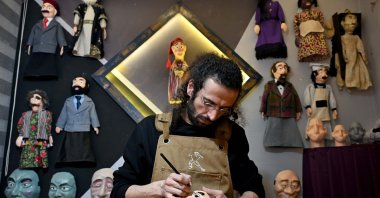 The puppeteer and theater artist Oğuzhan Vartolioğlu produces Ibiş puppets using a 3D printer, Erzurum, Türkiye, March 18, 2025. (IHA Photo)