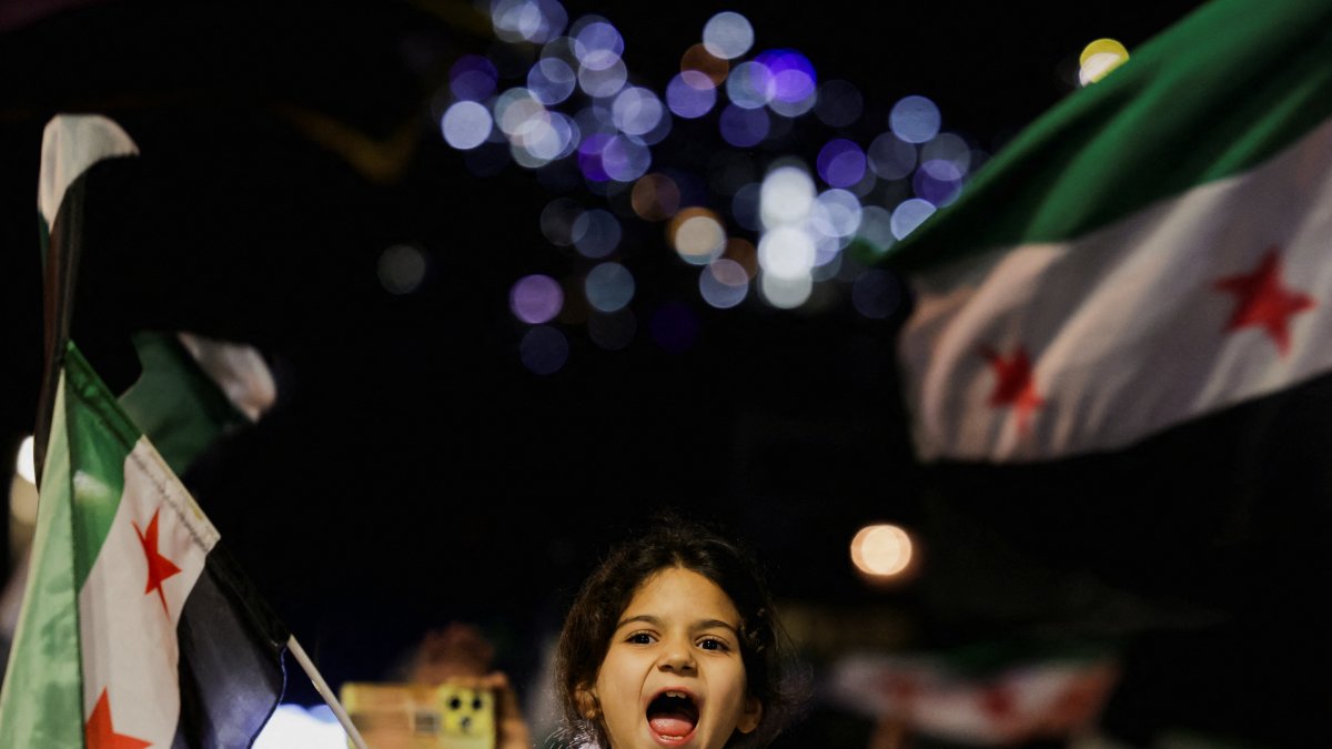 A child reacts during a demonstration marking the 14th anniversary of the start of the Syrian conflict, Damascus, Syria, March 15, 2025. (Reuters Photo)