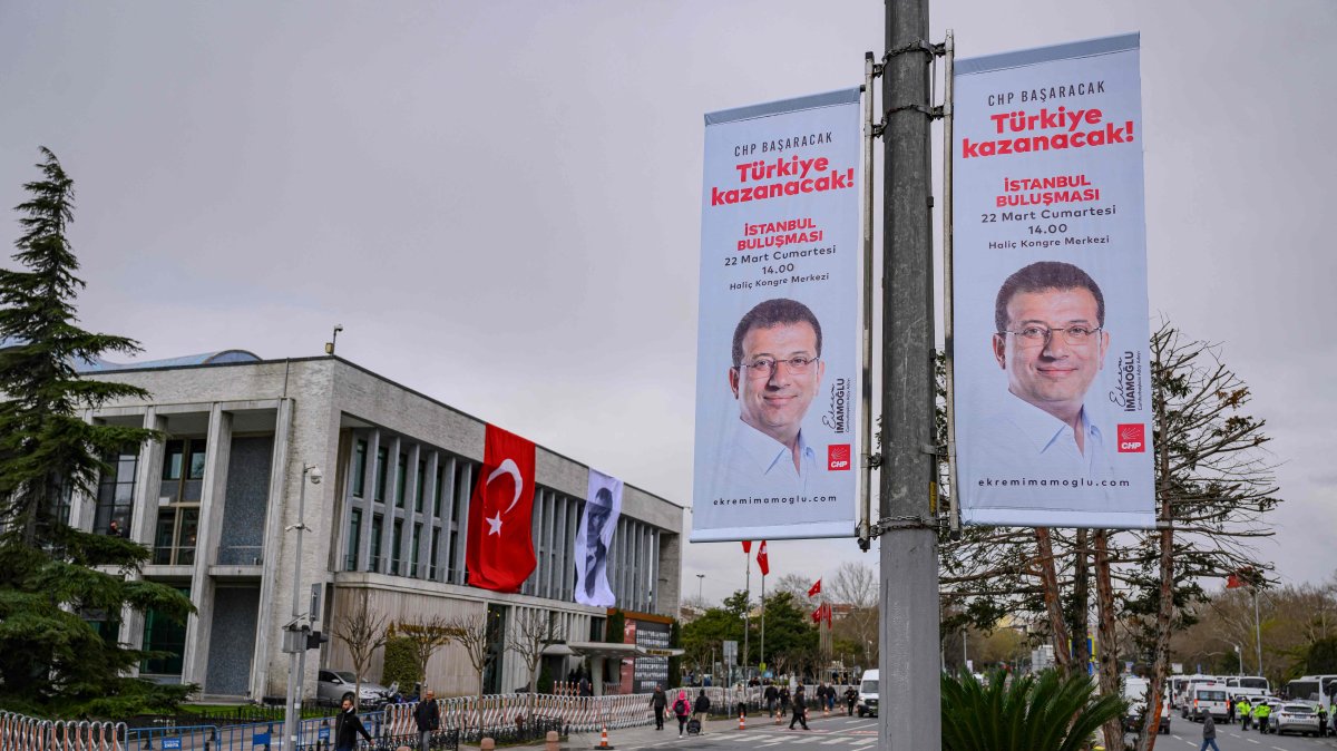 Banners with the image of Istanbul Mayor Ekrem Imamoğlu are displayed on a pole near the Istanbul Municipality headquarters, Istanbul, Türkiye, March 19, 2025. (AFP Photo)