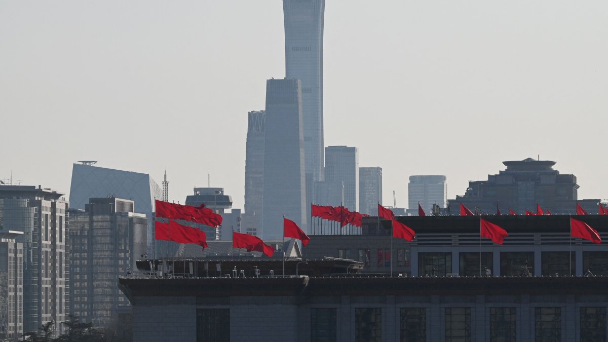 Flags fly on the National Museum of China near buildings in the central business district as seen from the Great Hall of the People in Beijing, China, March 6, 2025. (AFP Photo)