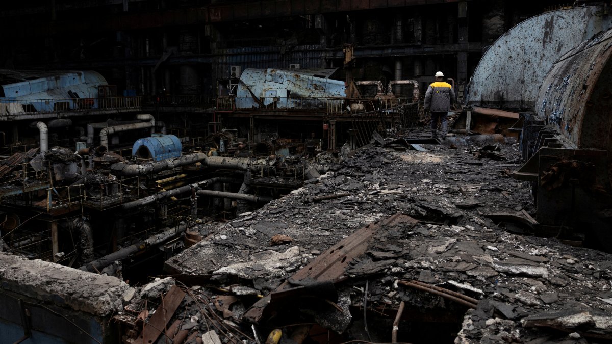 An employee walks at a thermal power plant damaged by multiple Russian missile strikes, in an undisclosed location in Ukraine, March 17, 2025. (Reuters Photo)