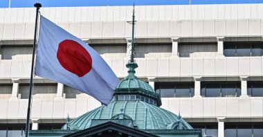 The Japanese flag flies over the Bank of Japan (BOJ) headquarters complex in central Tokyo, Japan, Jan. 23, 2025. (AFP Photo)