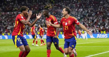 Spain&#039;s Mikel Oyarzabal (R) celebrates with Nico Williams (C) and Lamine Yamal after scoring his side&#039;s second goal during the final match against England at the Euro 2024 tournament, Berlin, Germany, July 14, 2024. (AP Photo)