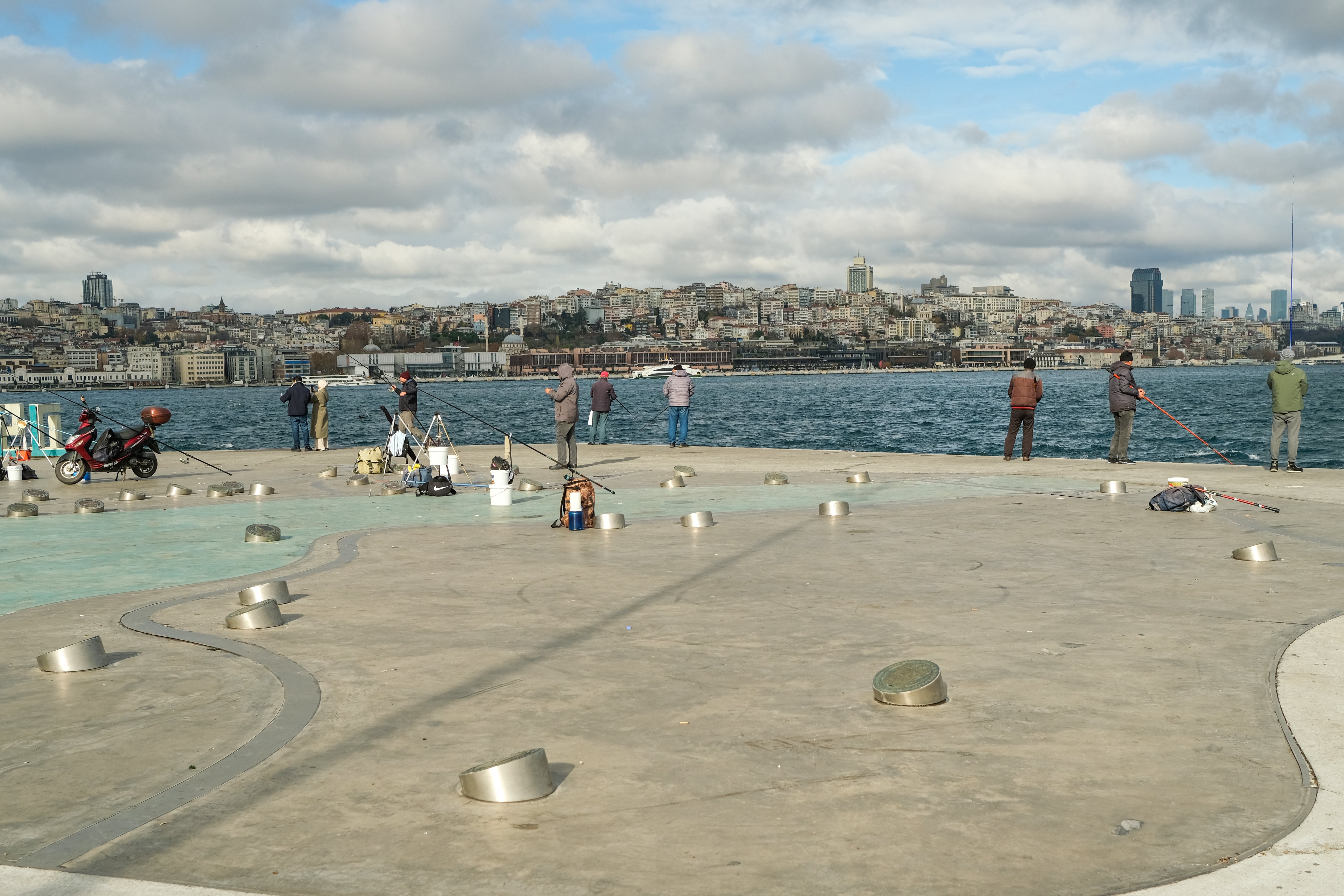 Fishermen are seen on the shores of the Bosporus, Istanbul, Türkiye, Dec. 5, 2024. (Reuters Photo)