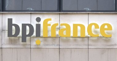 The logo of Bpifrance, France&#039;s new state-backed investment bank, is seen on the front door of the bank&#039;s headquarters, Maison-Alfort, southeast of Paris, France, June 18, 2013. (AFP Photo)
