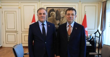 Istanbul Mayor Ekrem Imamoğlu (R) and Nuri Aslan, the first deputy chair of the Istanbul Metropolitan Municipality (IBB) Council are seen in this undated photo. (DHA Photo)