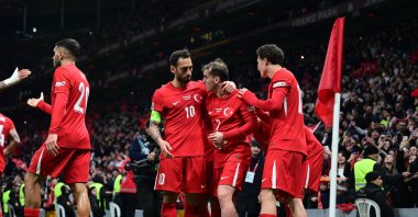 Turkish players celebrate after Kerem Aktürkoğlu&#039;s goal during the UEFA Nations League playoff first-leg football match against Hungary at the Rams Park, Istanbul, Türkiye, March 20, 2025. (AA Photo)
