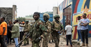 M23 rebels stand guard during a meeting organized by the M23 at the Stade de l'Unite after the town of Goma was taken by the M23 rebels, Goma, DRC, Feb. 6, 2025. (Reuters Photo)