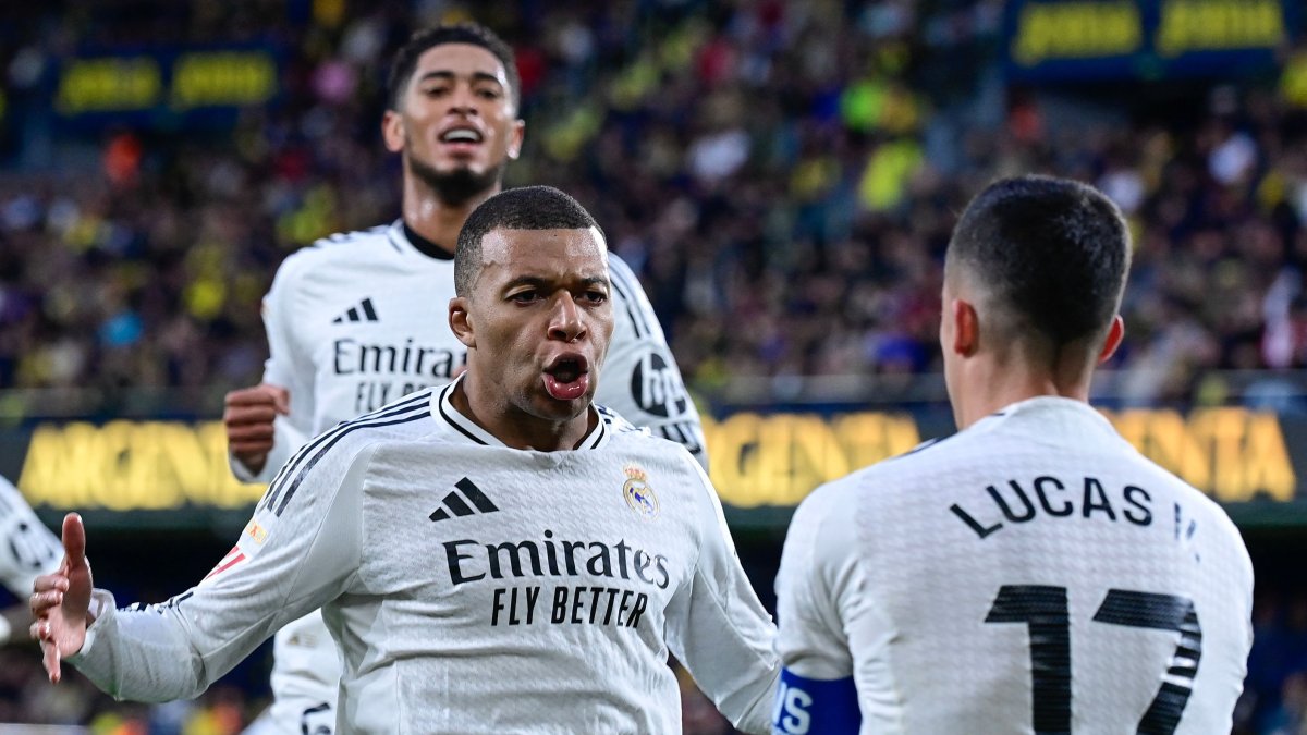 Real Madrid's Kylian Mbappe celebrates with his teammates after scoring their second goal during the La Liga match against Villarreal at La Ceramica Stadium, Vila-real, Spain, March 15, 2025. (AFP Photo)