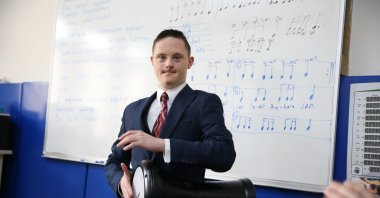 Koray Alp Ataman plays the darbuka during a school performance, Eskişehir, Türkiye, March 21, 2025. (AA Photo)