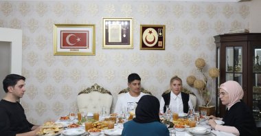 First lady Emine Erdoğan shares an iftar meal with the family of July 15 heroes, Ankara, Türkiye, March 20, 2025. (DHA Photo)