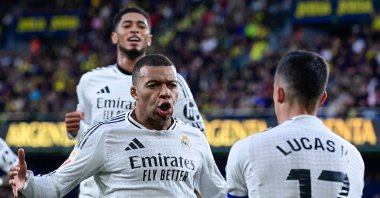 Real Madrid&#039;s Kylian Mbappe celebrates with his teammates after scoring their second goal during the La Liga match against Villarreal at La Ceramica Stadium, Vila-real, Spain, March 15, 2025. (AFP Photo)