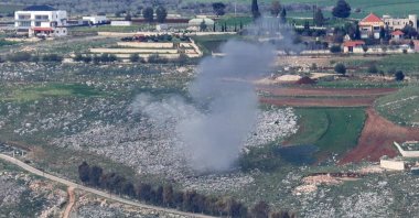 Smoke billows from the site of Israeli artillery shelling that targeted the area of the southern Lebanese village of Yohmor, March 22, 2025. (AFP Photo)