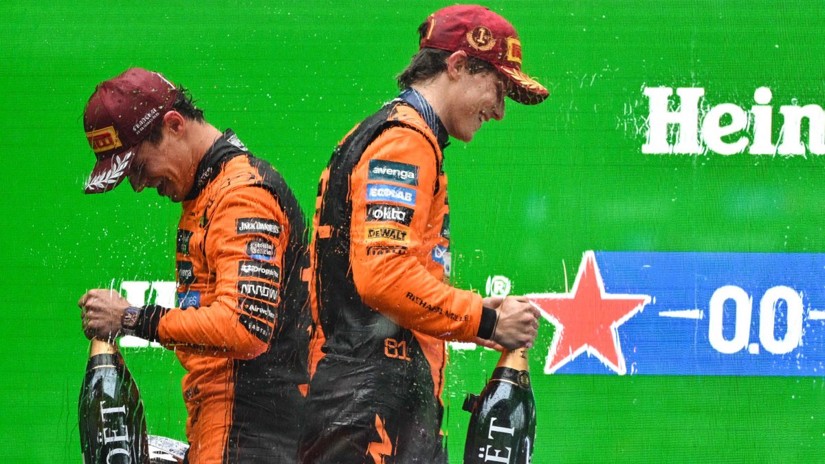 Winner McLaren&#039;s Australian driver Oscar Piastri (R) and second-placed Lando Norris celebrate on the podium after the F1 Chinese GP, Shanghai, China, March 23, 2025. (AFP Photo)