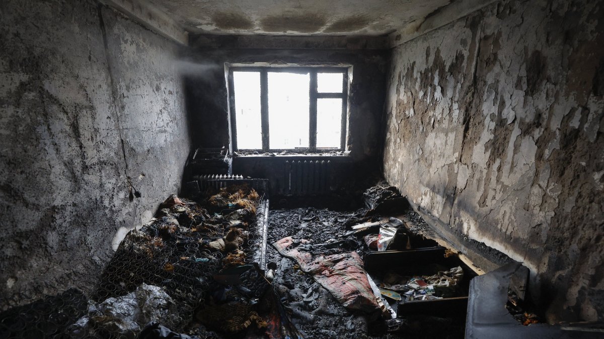 An internal view of a burned flat at the site of the night drone attack in Kyiv, Ukraine, March 23, 2025. (EPA Photo)