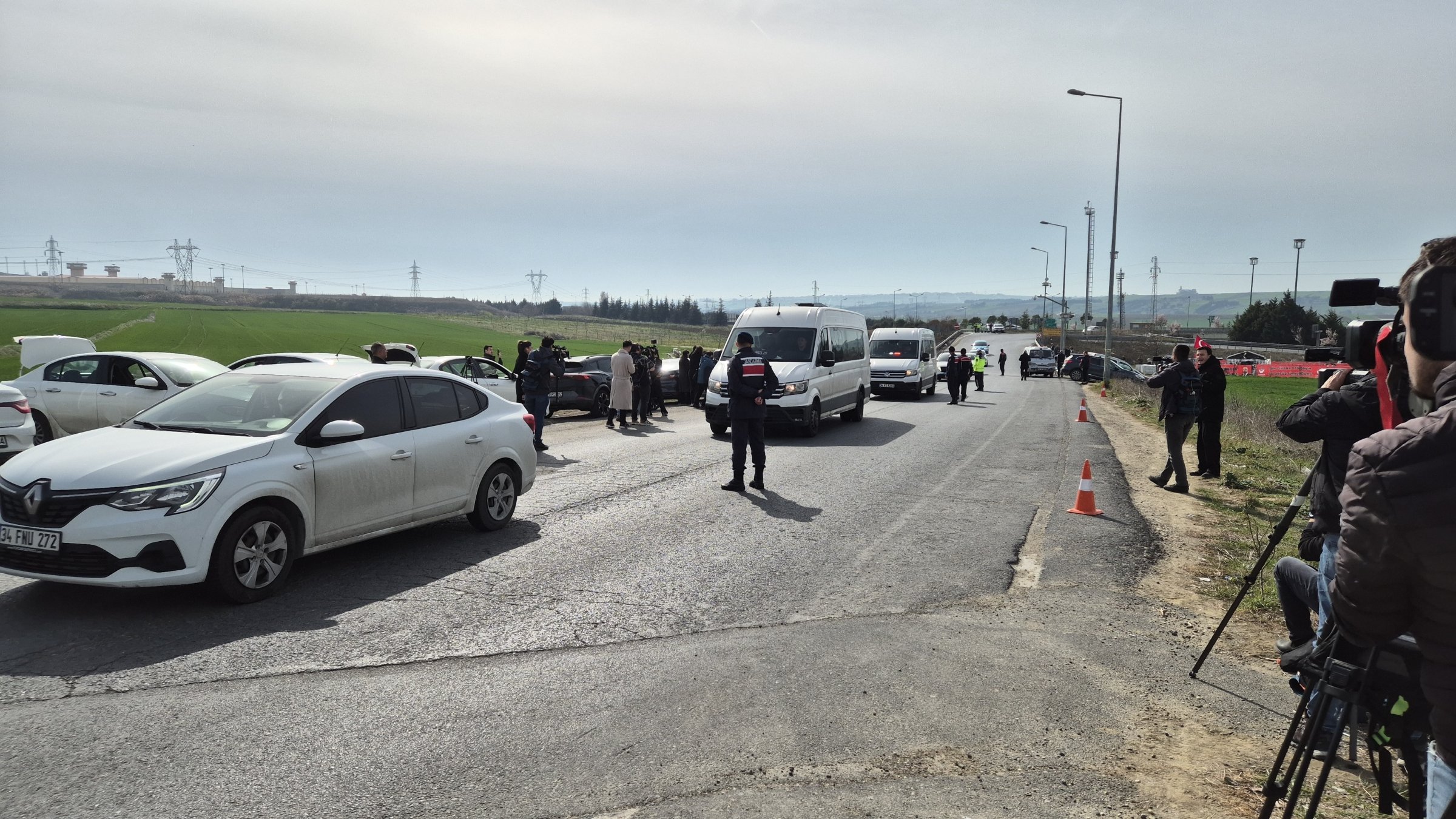 Media crews wait as vehicles carrying suspects arrive in the Silivri prison, Istanbul, Türkiye, March 23, 2025. (İHA Photo)
