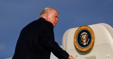 U.S. President Donald Trump boards Air Force One as he departs for Philadelphia, Pennsylvania, from Morristown Municipal Airport, Morristown, New Jersey, U.S., March 22, 2025. (Reuters Photo)