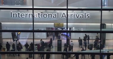 People wait near the international arrival area at Terminal 2 in Heathrow Airport in Hounslow, London, U.K., March 22, 2025. (EPA Photo)