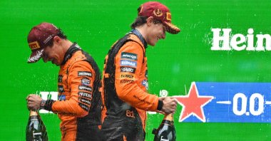 Winner McLaren&#039;s Australian driver Oscar Piastri (R) and second-placed Lando Norris celebrate on the podium after the F1 Chinese GP, Shanghai, China, March 23, 2025. (AFP Photo)