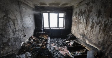 An internal view of a burned flat at the site of the night drone attack in Kyiv, Ukraine, March 23, 2025. (EPA Photo)