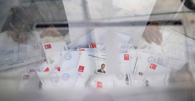 Ballot papers for the only candidate, Ekrem Imamoğlu, fill a ballot box at a polling station, Istanbul, Türkiye, March 23, 2025. (AFP Photo)