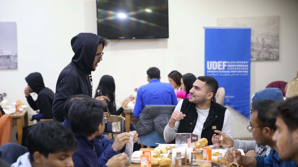 Foreign students gather for iftar in a warm, communal setting, Erzurum, Türkiye, March 23, 2025. (AA Photo)