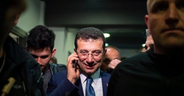 Ekrem Imamoğlu speaks on the phone before a news conference, Istanbul, Türkiye, April 1, 2019. (AFP Photo)