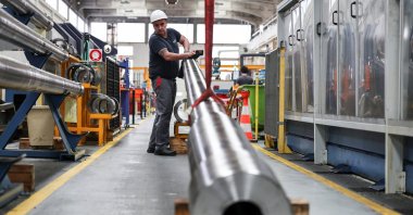 An employee operates on a Caesar cannon at an armament factory of the French-German military defense system supplier KNDS, Bourges, France, March 21, 2025. (Reuters Photo)