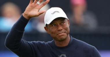 Tiger Woods of the U.S. acknowledges the crowd at the 152nd Open Championship, Royal Troon Golf Club, Troon, Scotland, U.K., July 19, 2024. (Reuters Photo)