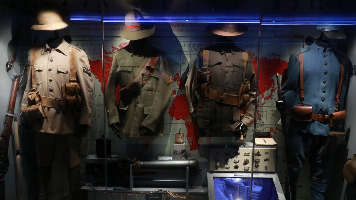 Turkish and ANZAC military uniforms from the Gallipoli campaign are displayed at the mobile museum in Skanderbeg Square, Tirana, Albania, March 24, 2025. (AA Photo)
