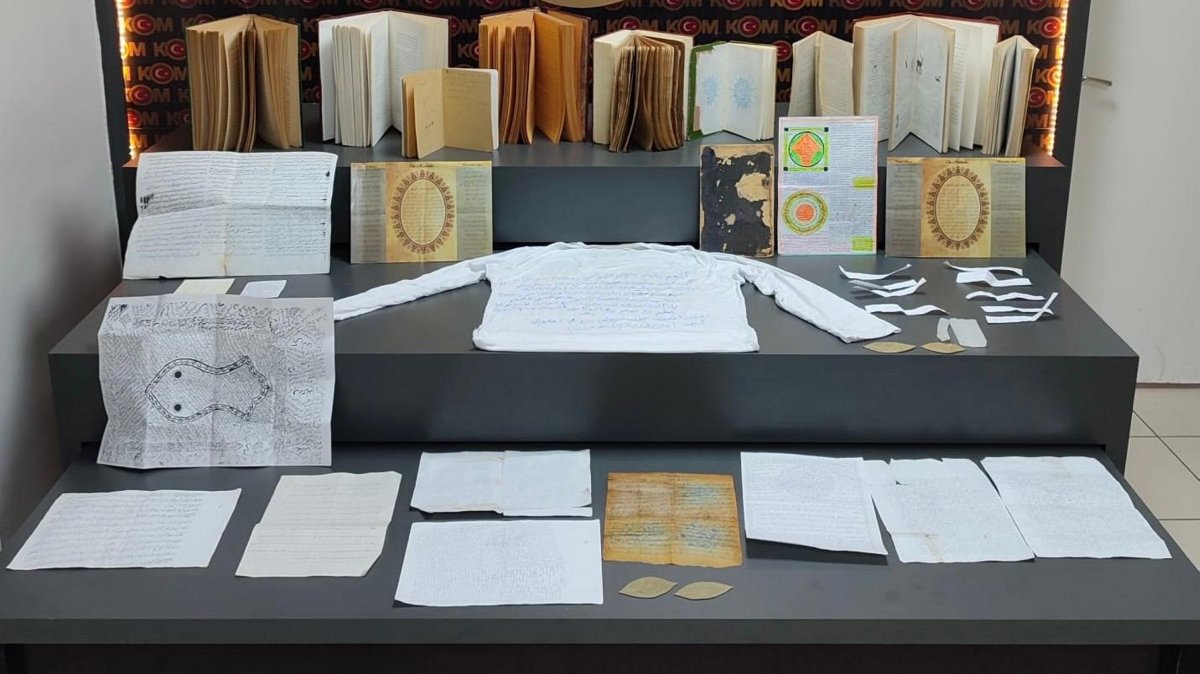 Notebooks, papers and books believed to be used for witchcraft are seized during searches of the suspects&#039; homes, Batman, southeastern Türkiye, March 21, 2025. (AA Photo)